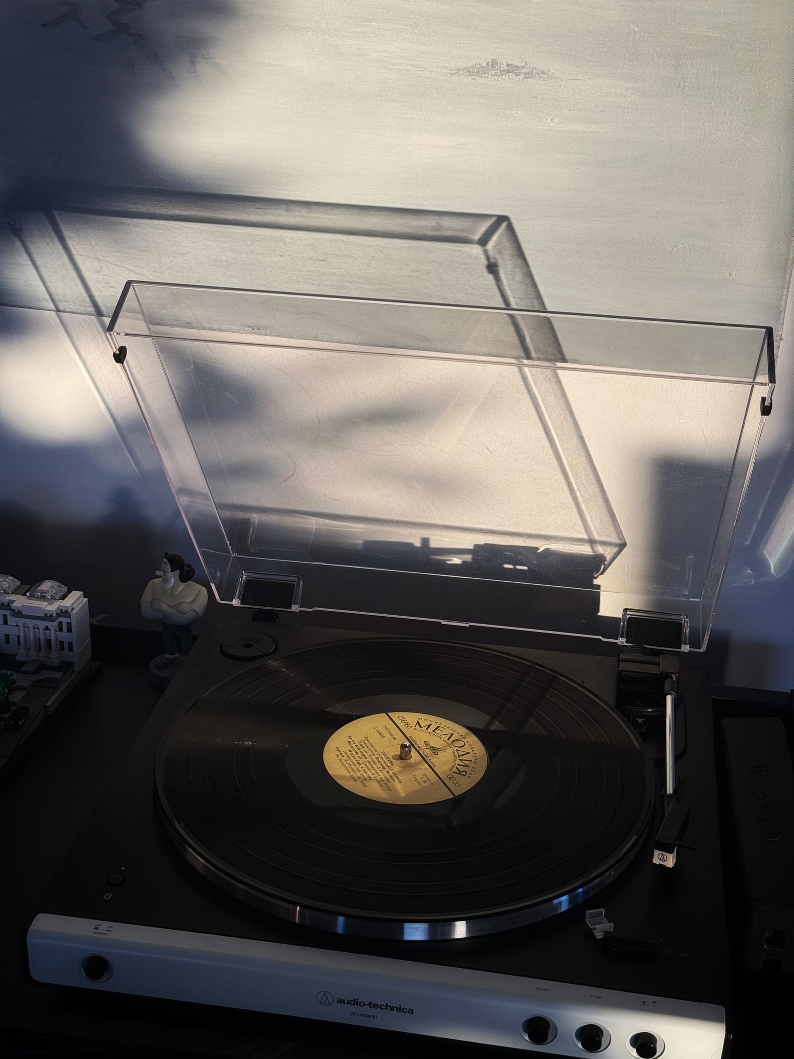 Turntable with its dust cover raised