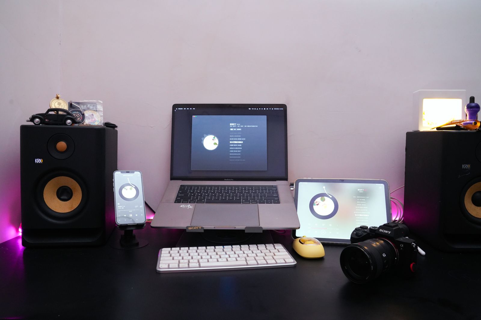 Laptop with audio equipment and speakers in a home workspace